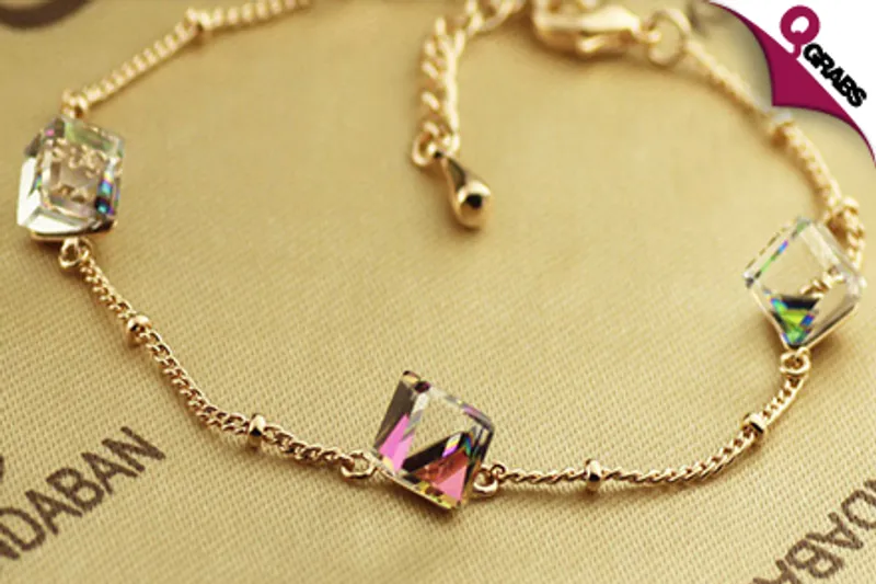 For QR129 Sparkle with a Rose Gold Bracelet with Three Block-Shaped Swarovski Elements in Two Pretty Tints! (QR275 Value)